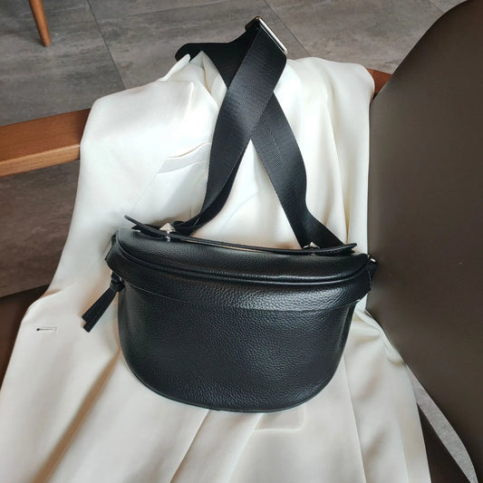 Sac en Cuir Noir Bandoulière noir fauteuil